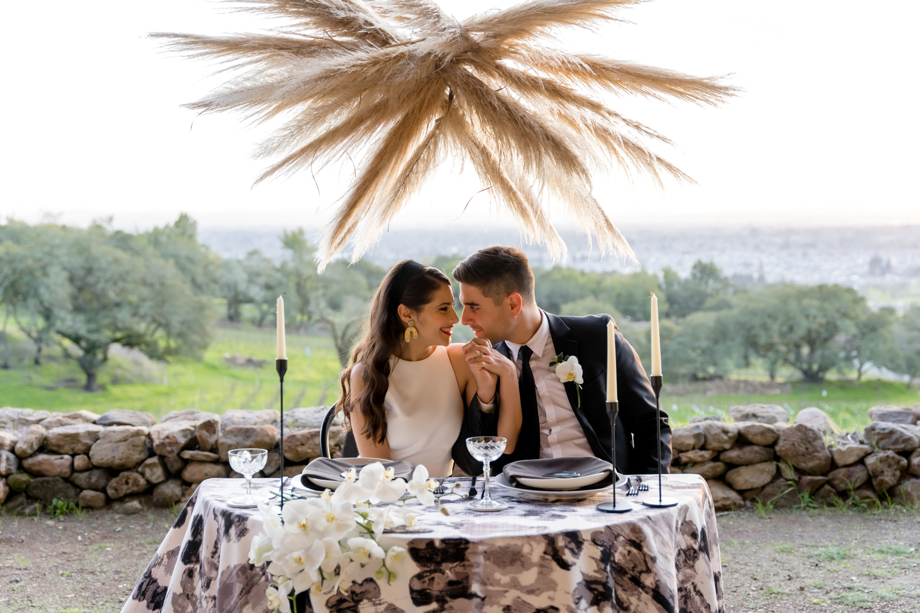 Black and White Sweetheart Table with Pampas Grass Installation